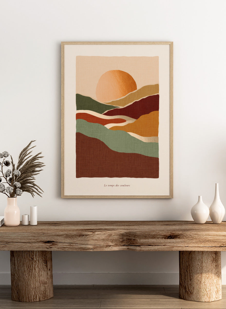 Shop Earthy Sunset Landscape by Dominique Vari, a retro landscape wall art print poster featuring rolling hills, a glowing orange sun, and warm earthy tones.