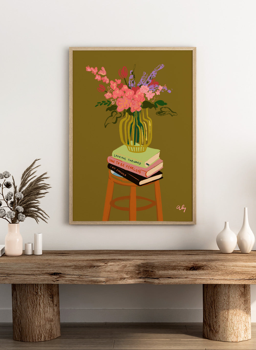 Vase with flowers on a stack of books on a stool against a green background. Floral Vase by Arty Guava is a modern flower still life art print with a striped vase and book stack. Officially licensed wall poster.