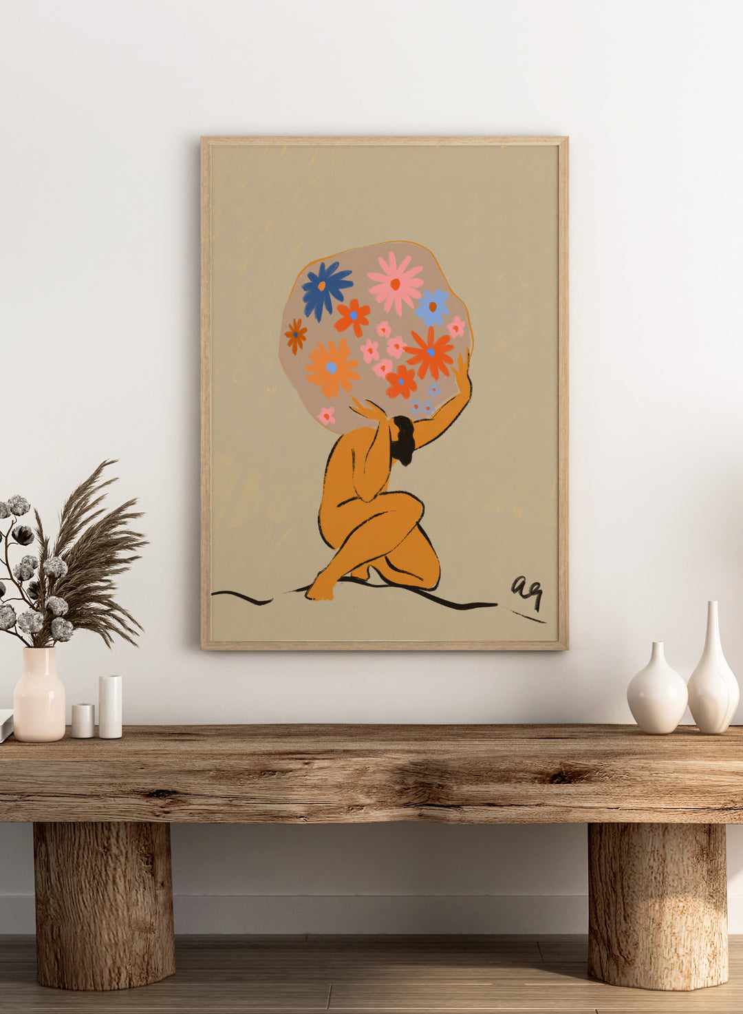 Surreal artwork of a figure holding a globe filled with colorful flowers on a beige background. World On Her Shoulders by Arty Guava is a colorful contemporary art print featuring a floral globe, expressive female figure, empowerment, and modern illustration.