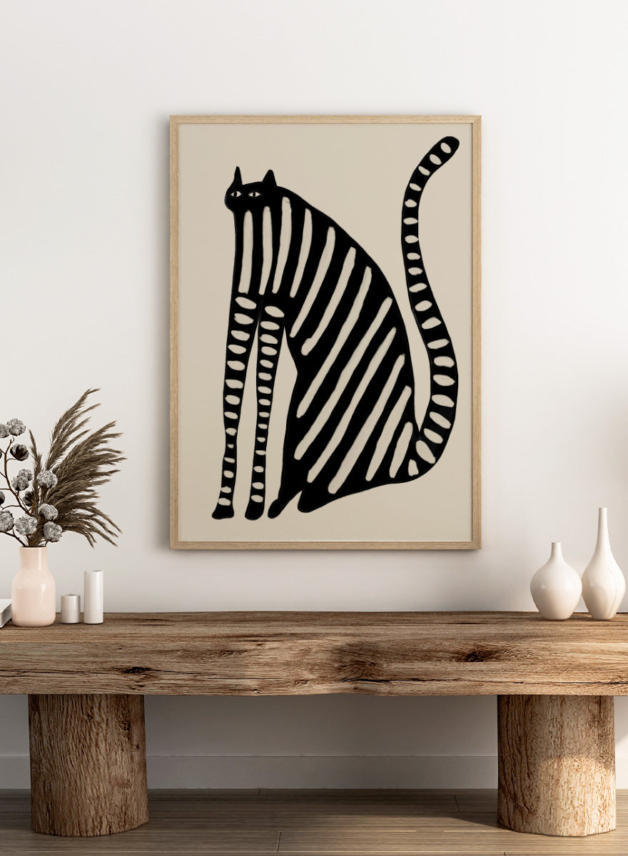 Striped Black Cat by The Art Concept playful cat art print featuring an elongated black cat with cream stripes, long legs, and an oversized curved tail.