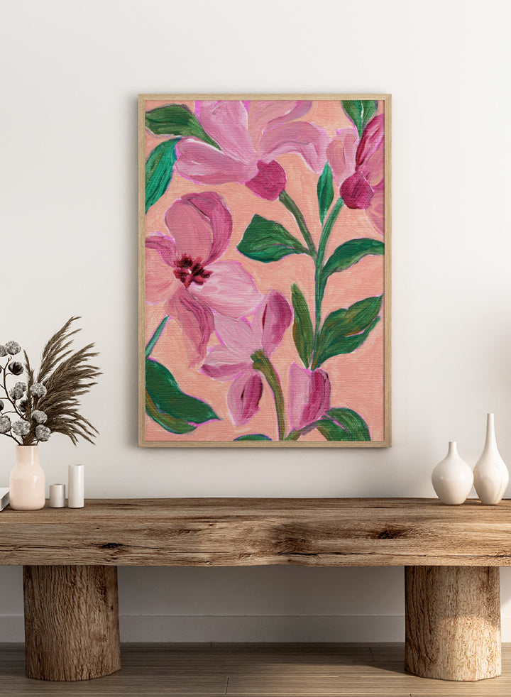 Shop Vibrant Pink Blooms by Nikita Jariwala, a floral wall art print poster featuring oversized pink flowers, lush green leaves, and a bold botanical composition.
