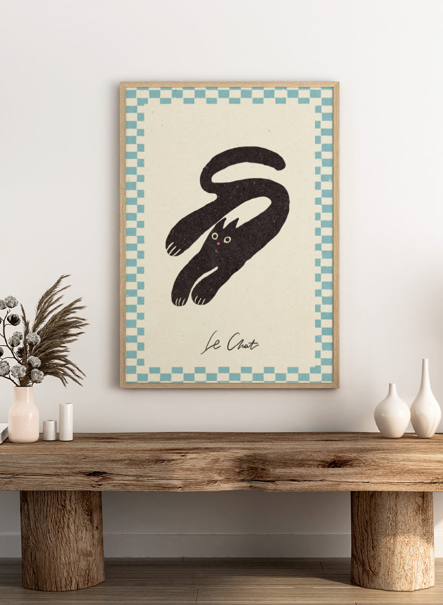 Shop Le Chat No.03 by NKTN, a playful black cat wall art print poster featuring a stretched cat, checkerboard border, and quirky vintage-inspired graphic style.