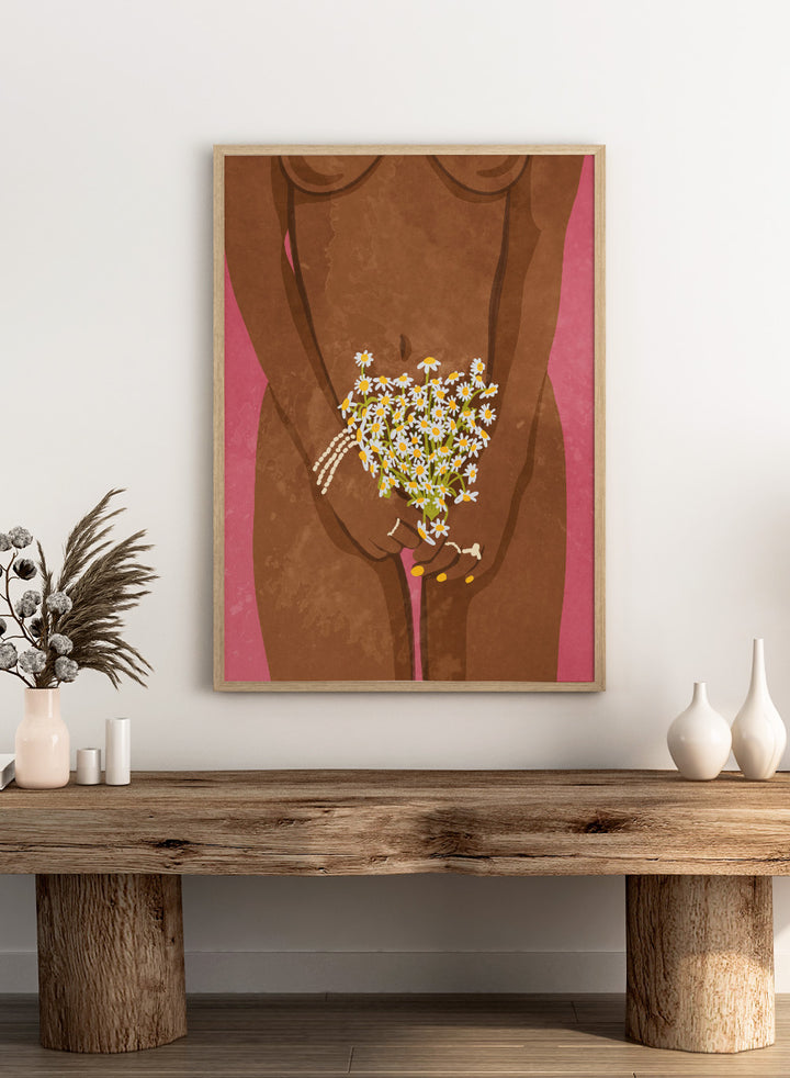Illustration of a hand holding flowers against a brown background. Wearing Flowers by Raissa Oltmanns is a modern woman portrait art print with daisies, pink background, and minimalist graphic wall poster design.