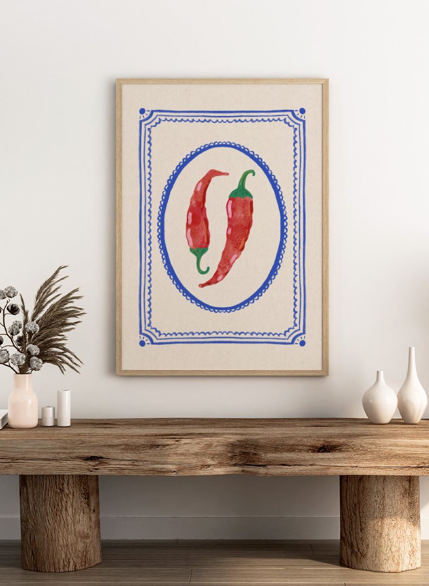Spicy Chili Peppers by Katarzyna Gąsiorowska kitchen art print featuring red chilies in an ornate cobalt frame with vintage Mediterranean style.