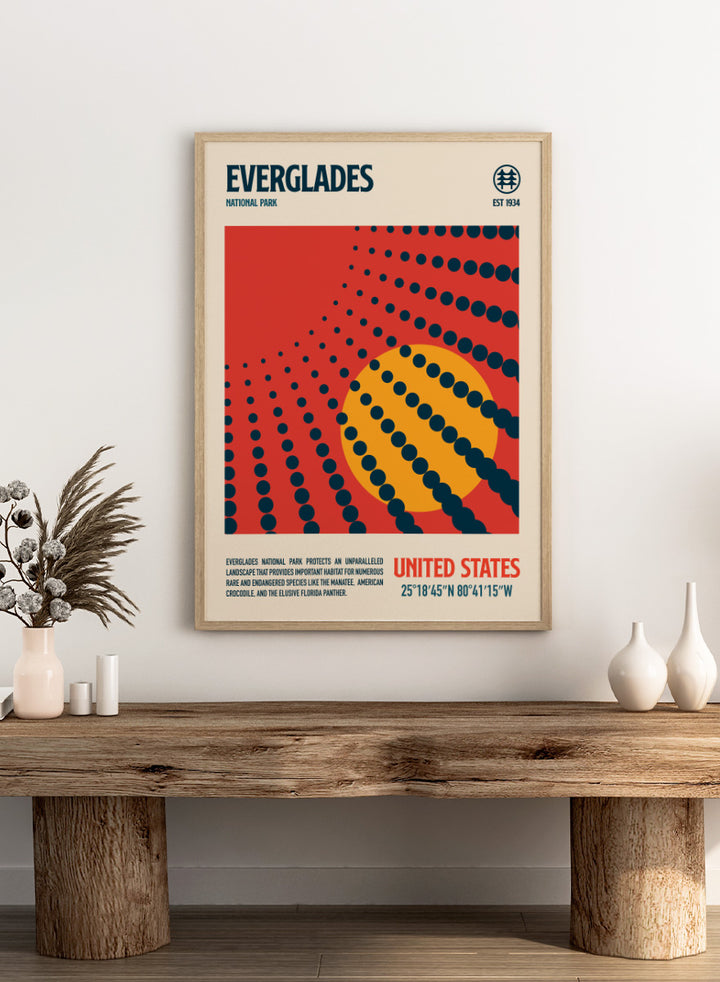 A vintage-style travel poster for Everglades National Park, United States, featuring a bold red background, a large yellow circle, and dark blue dotted radial lines. The top reads &
