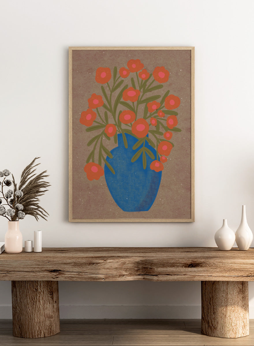 A stylized floral artwork showing orange flowers with pink centers and green stems arranged in a blue vase against a textured tan background. Shop Rustic Orange Floral Vase by Nikita Jariwala, a modern floral wall art print poster featuring a blue vase, orange flowers, and bold botanical style.