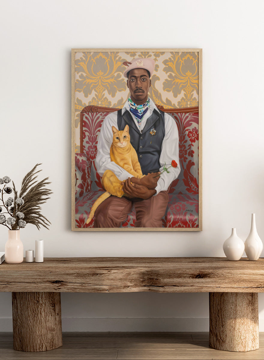 A portrait-style artwork of a Black man seated on a red patterned sofa, holding a yellow-orange cat and a red rose. The background features ornate gold and beige damask wallpaper. Shop Dapper Man Orange Cat Red Rose by Damilare Jamiu, a contemporary portrait wall art print featuring a stylish man, orange cat, red rose, and rich vintage-inspired pattern.