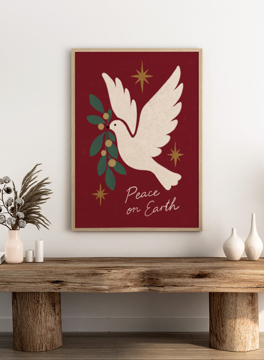 Shop Peace On Earth Dove by Katarzyna Gąsiorowska, a Christmas wall art print poster featuring a white peace dove, olive branch, stars, and festive holiday message.
