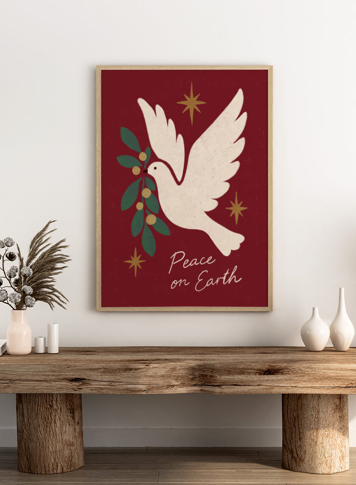 Shop Peace On Earth Dove by Katarzyna Gąsiorowska, a Christmas wall art print poster featuring a white peace dove, olive branch, stars, and festive holiday message.
