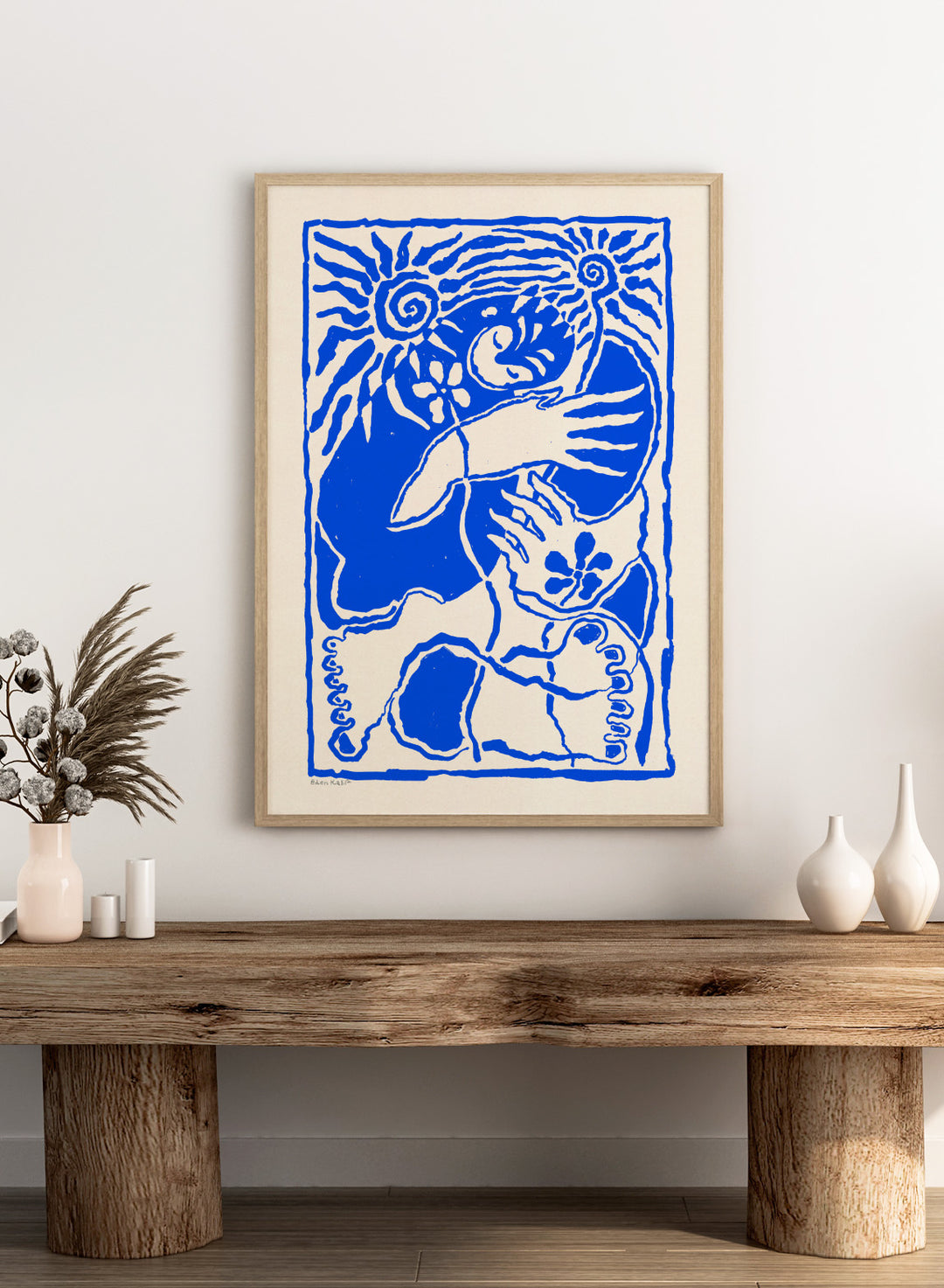 Blue and white abstract design with a central figure and sun-like elements on a beige background. Protection Blue by Eden Kalif is a modern figurative art print in bold blue, a contemporary minimalist wall poster with symbolic forms and expressive line work.