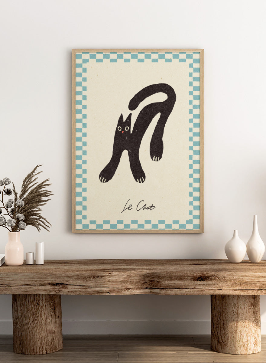 Shop Le Chat by NKTN, a playful black cat wall art print poster featuring a quirky stretched cat, checkerboard border, and vintage-inspired graphic style.