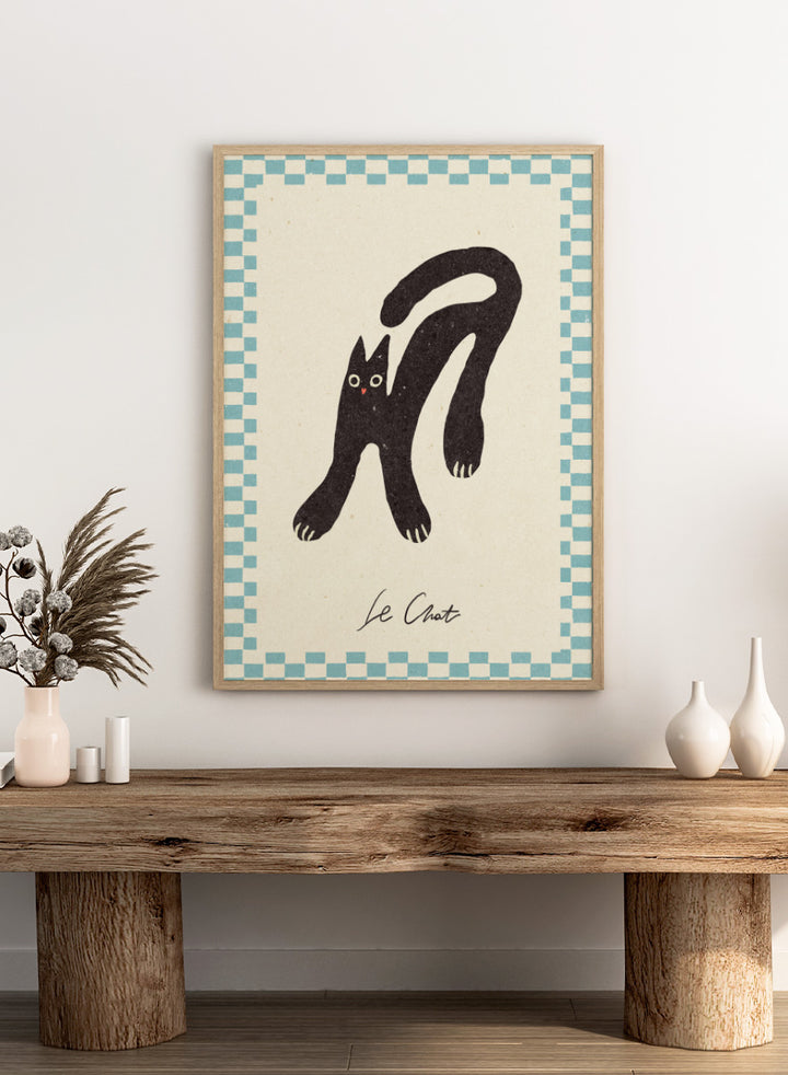 Shop Le Chat by NKTN, a playful black cat wall art print poster featuring a quirky stretched cat, checkerboard border, and vintage-inspired graphic style.