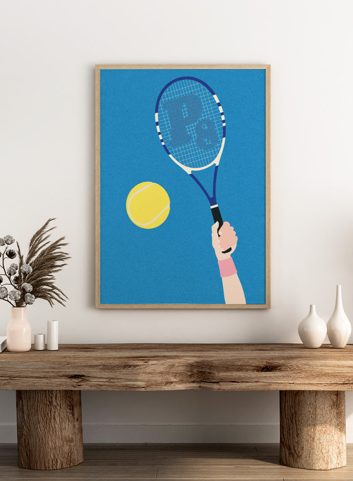 Tennis racket and ball on a blue background. Perfect Serve by Rosi Feist is a modern minimalist tennis art print featuring bold graphic color, clean lines, and Bauhaus-inspired design. Officially licensed fine art poster with framing.