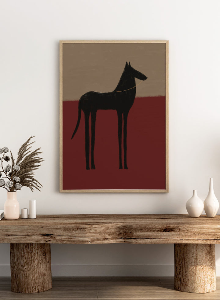 A stylized painting of a black dog silhouette standing in profile against a two-tone background with a beige upper half and a deep red lower half. Abstract Black Horse by The Art Concept animal art print featuring a tall black horse against deep red and muted taupe tones.