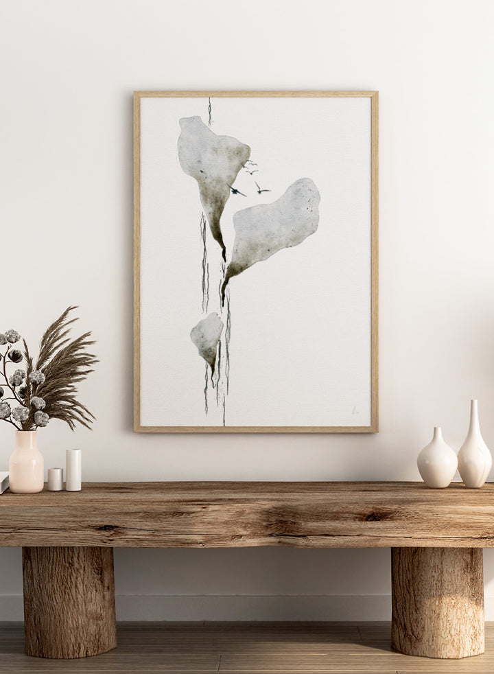 Abstract watercolor art print featuring three irregular, dripping white and gray forms on a white background, with small dark birds near the top. Shop Melting Ice And Birds by Ankie Kooi, a nature wall art print poster with abstract watercolor ice, flying birds, minimalist landscape art, blue, gray, and cream.