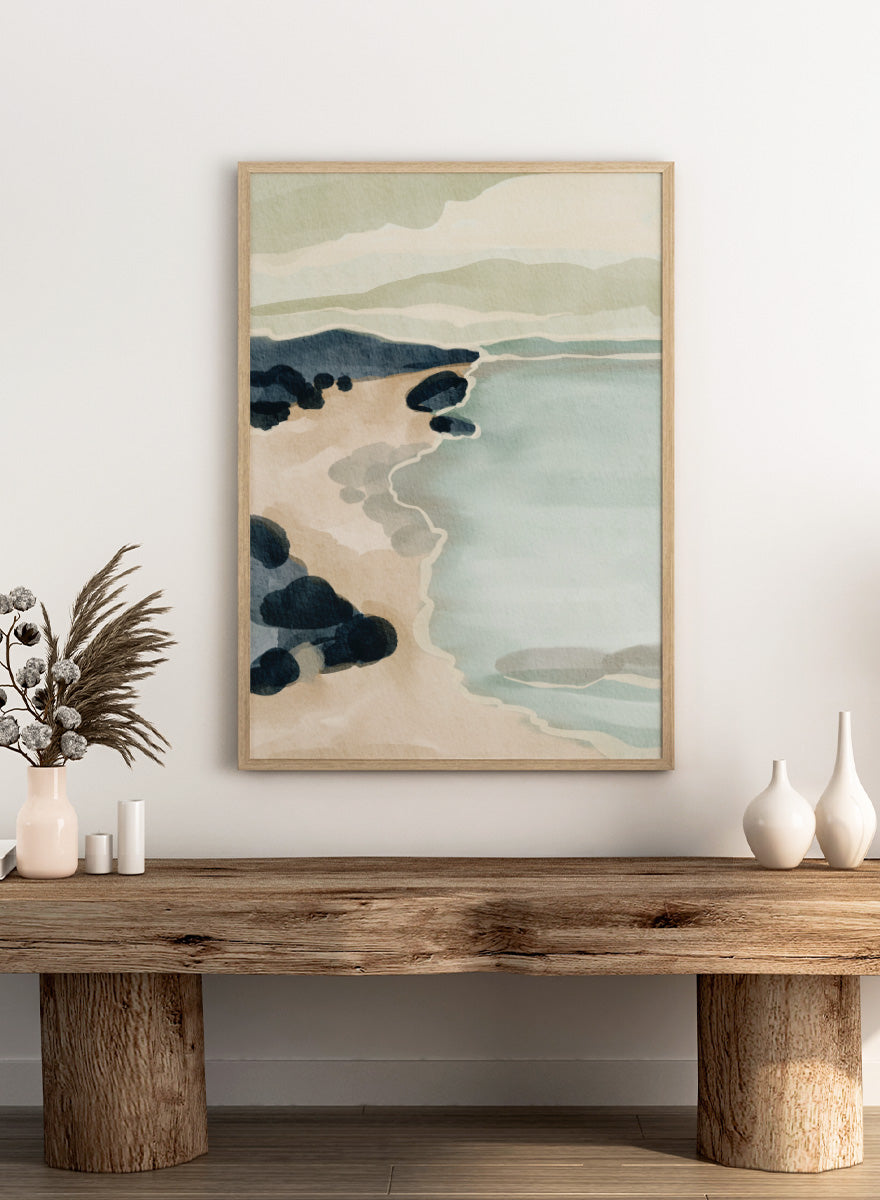 Shop Coastal Serenity by Nikita Jariwala, a modern coastal wall art print featuring a soft shoreline, abstract seascape, rocky beach, and pale blue, sage, and cream tones.