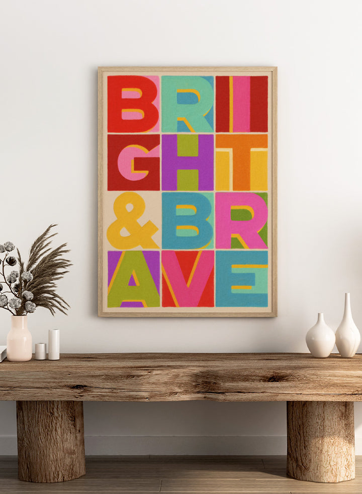 Shop Bright and Brave Letters by Dominique Vari, a colorful typography wall art print poster featuring bold retro lettering in pink, red, blue, green, and yellow.