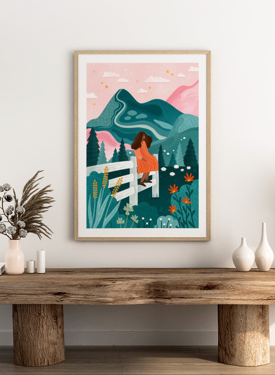 Shop Woman Rural Starry Night by Bea Müller, a figurative landscape wall art print poster featuring a woman, mountain scenery, wildflowers, and a pink starry sky.