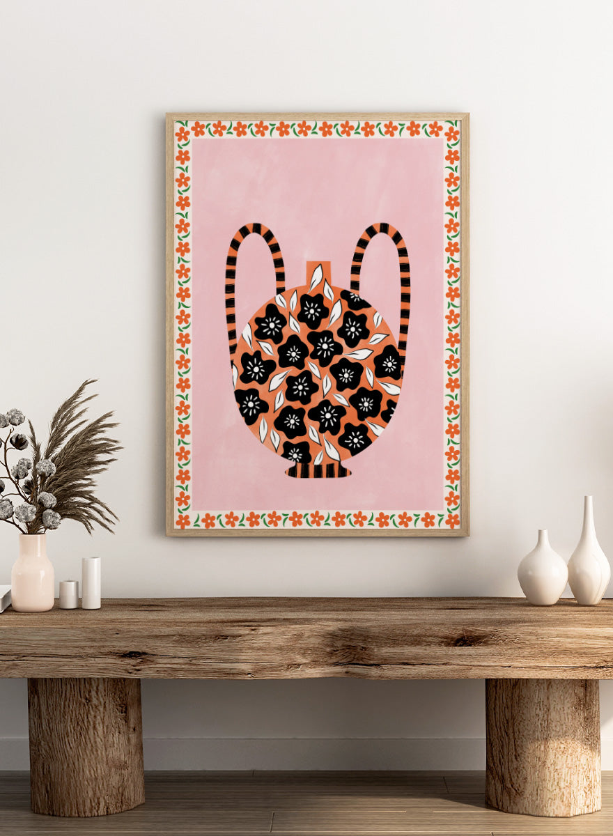 Shop Orange Floral Vase by Elena Ristova, a colorful floral wall art print poster featuring black flowers, striped handles, pink, orange, green, and folk-inspired details.