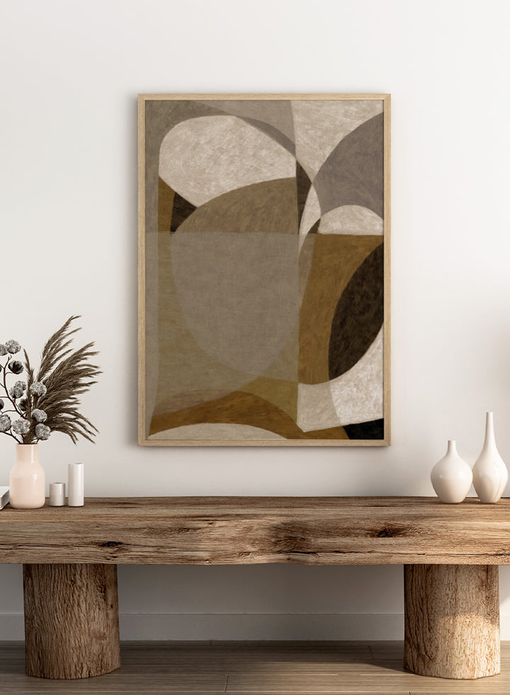 An abstract geometric area rug featuring overlapping organic shapes in shades of taupe, beige, brown, and charcoal gray. Shop Earthy Abstract Shapes by Dan Hobday, a neutral abstract art print featuring layered organic forms, warm earthy tones, and soft textured detail.