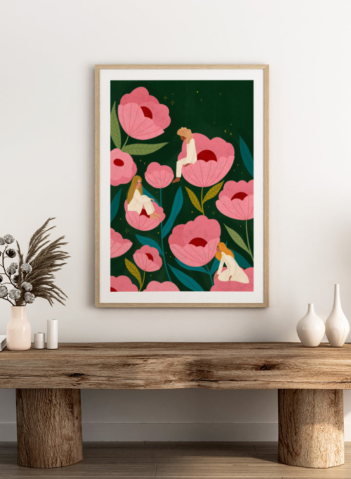 Shop Calm Women in Flowers by Bea Müller, a figurative floral wall art print poster featuring women among oversized pink flowers in a dreamy garden.