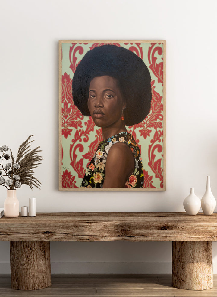 A portrait painting of a woman with a large dark afro hairstyle, wearing a floral-patterned sleeveless top, set against a red and cream damask wallpaper background. Shop Elegant Afro Floral Portrait by Damilare Jamiu, a contemporary portrait art print featuring a woman with afro hair, floral fashion, and rich green and coral tones.