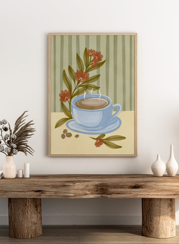 Shop Steaming Coffee Bloom by Nikita Jariwala, a kitchen wall art print poster featuring a blue coffee cup, floral still life, coffee beans, and blue tones.