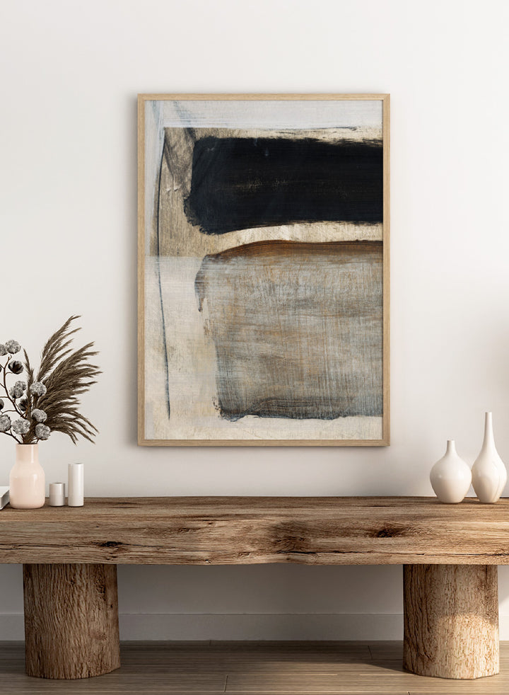 Abstract square artwork with broad textured brushstrokes in black, warm brown, gray, and off-white. Shop Desire by Dan Hobday, a contemporary abstract art print featuring bold black forms, earthy brown tones, layered brushwork, and a textured neutral palette.