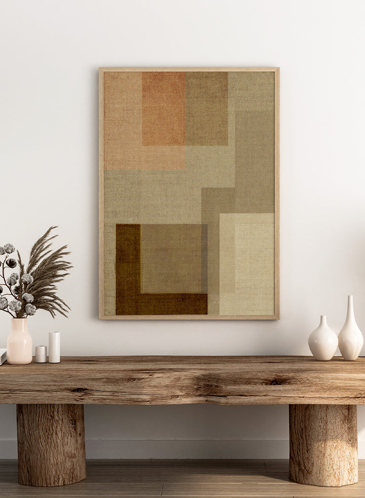 An abstract geometric area rug with a textured linen-like weave, featuring overlapping rectangles in shades of beige, brown, tan, and a muted peach-pink. Shop Muted Geometric Layers by Dan Hobday, a neutral abstract art print featuring layered geometric forms, soft earthy tones, and subtle woven texture.
