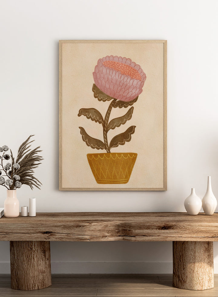 Shop Rustic Potted Flower by Nikita Jariwala, a floral wall art print poster featuring an oversized pink flower, mustard pot, folk art details, and earthy tones.