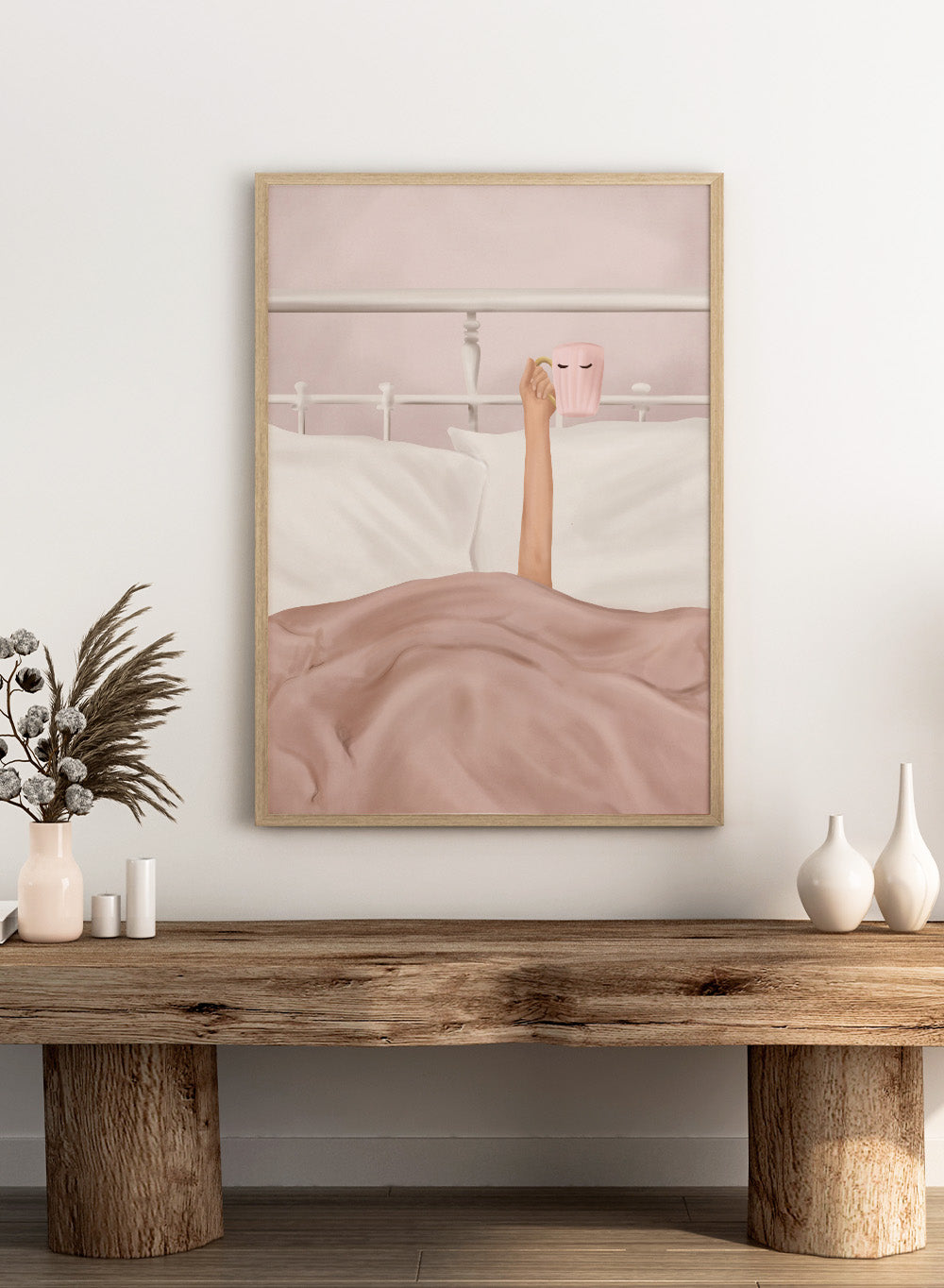 Coffee Cup by Flow Line is a cozy morning art print featuring a woman in bed holding a pink mug. A modern lifestyle wall poster celebrating slow mornings.