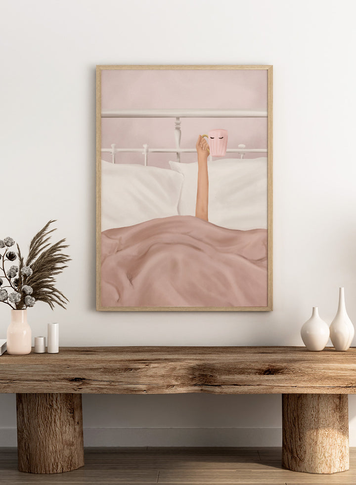 Coffee Cup by Flow Line is a cozy morning art print featuring a woman in bed holding a pink mug. A modern lifestyle wall poster celebrating slow mornings.