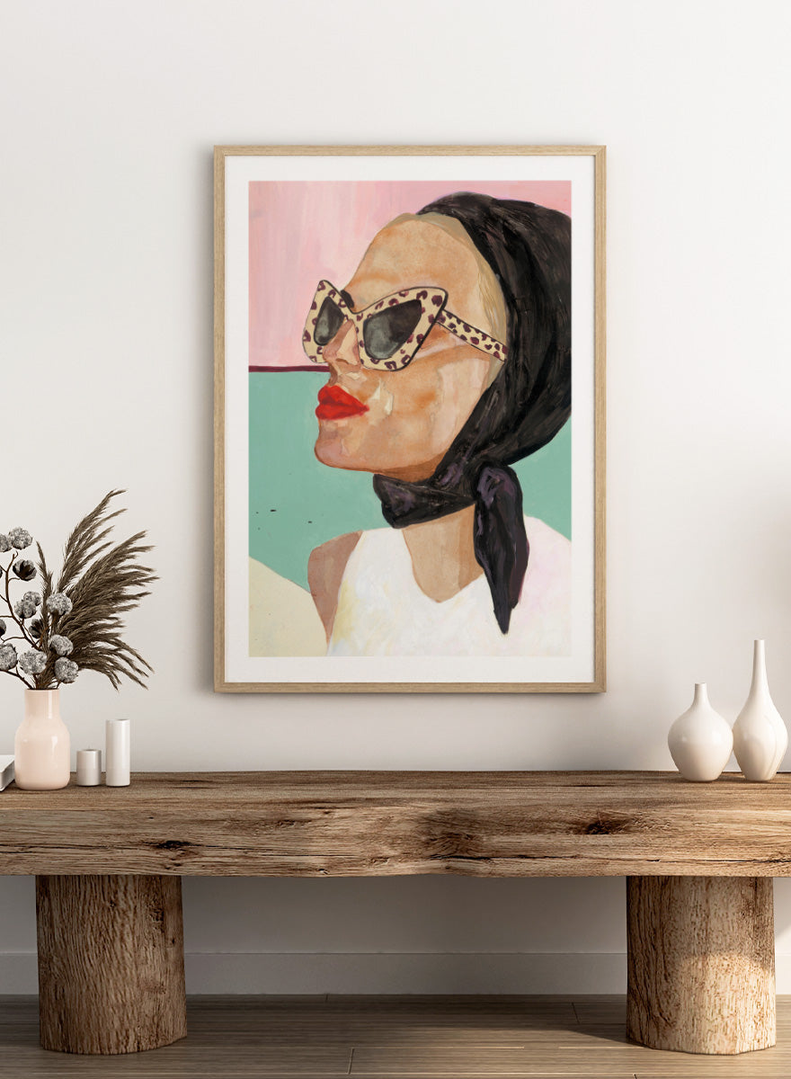 Shop Chic Scarf Sunglasses by Sophia Novosel, a modern female portrait wall art print poster featuring cat-eye sunglasses, red lips, and a black scarf.