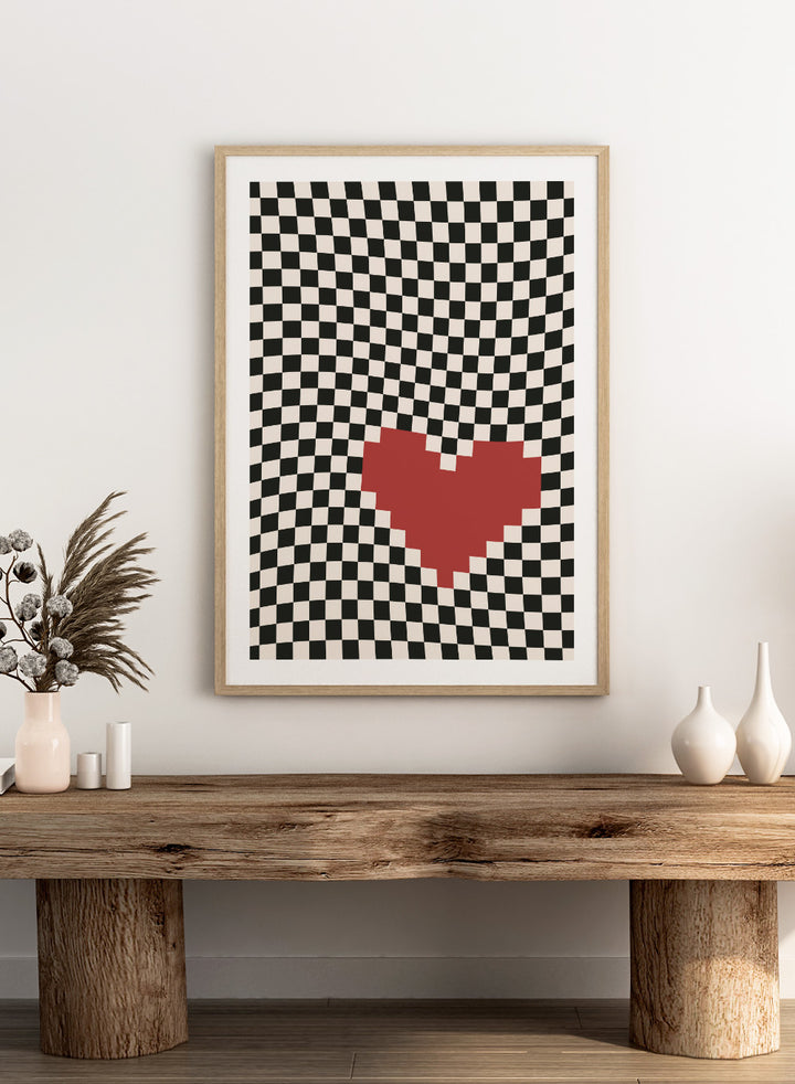 Checkered pattern with a red heart in the center. Pixel Heart by Frankie Kerr-Dineen features a red pixel heart on a wavy checkerboard background. Modern graphic art print and contemporary wall poster.