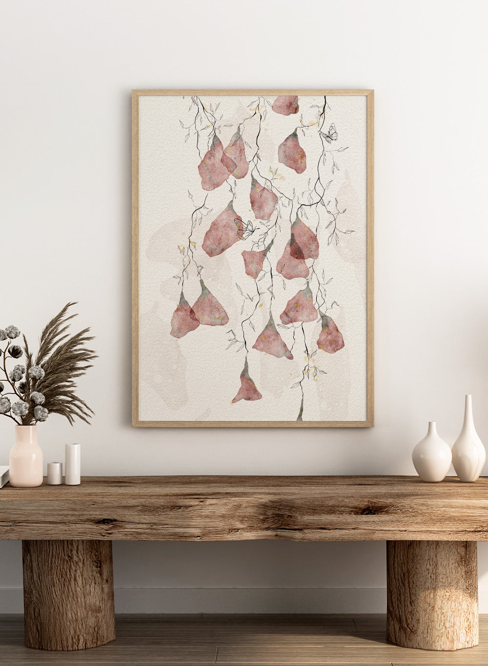 Artistic depiction of pink flowers and branches on a light background. Butterfly Kisses by Ankie Kooi features hanging watercolor flowers, delicate branches, and butterflies in soft neutral tones. Minimal botanical art print inspired by nature.