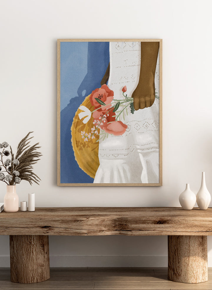 Close-up of a person holding a floral arrangement with a blue background. Feeling Blue by Goed Blauw is a figure art print and wall poster featuring a woman holding flowers with a deep blue background and soft tones.