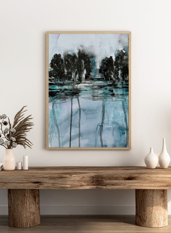 Shop Dark Forest Reflection by Helena Ryhle, a moody watercolor landscape wall art print poster featuring dark trees, reflective water, and deep blue-green tones.
