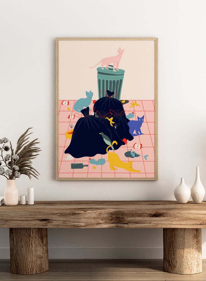 Illustration of a trash can and cats on a pink grid background. Cats by Jota de Jai is a funny modern wall art print featuring colorful cats taking over a messy room. Officially licensed fine art poster with optional wood frame.
