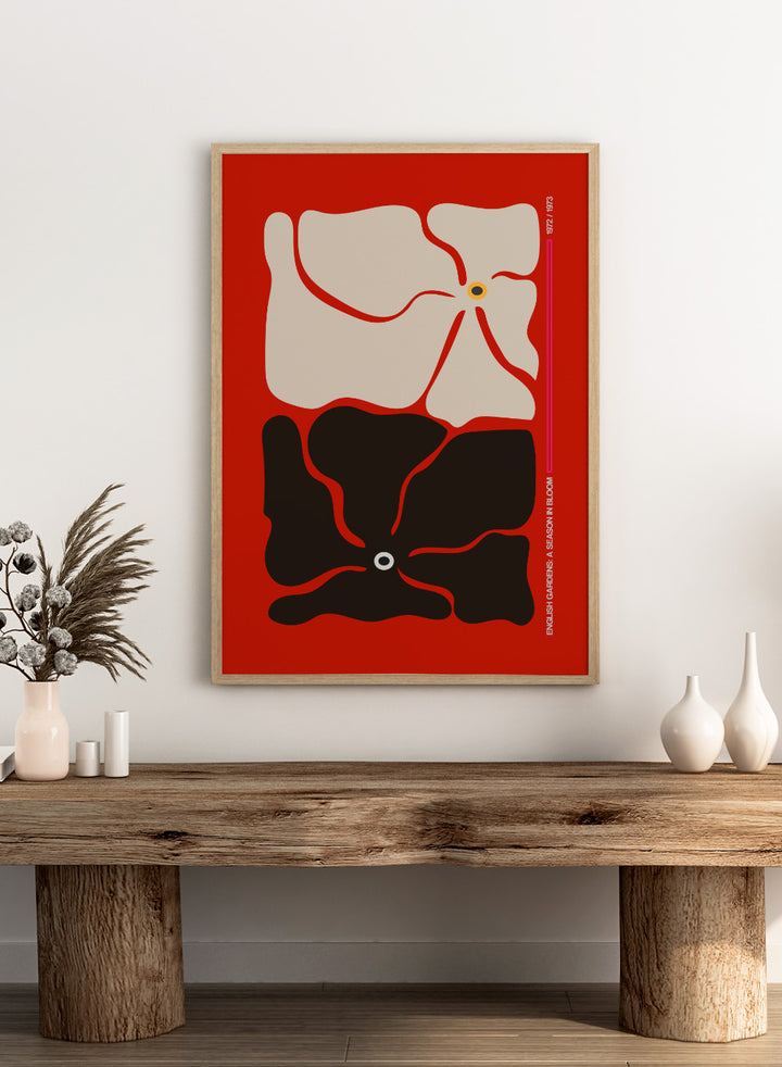 Abstract design with beige and black shapes on a red background. Two By Two Flower Red by Frances Collett is a modern abstract floral art print featuring two bold flowers in red, black, and cream tones. Officially licensed wall poster with optional framing.