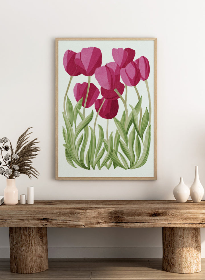 A stylized floral illustration of pink tulips with green leaves on a white background. Shop Tulips Floral Art Print by Katie O&