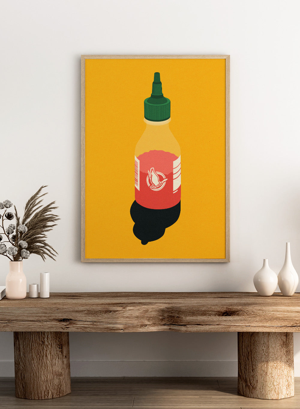 Chilli sauce bottle illustration on a yellow background. Chilli Sauce by Rosi Feist is a bold kitchen art print featuring a hot sauce bottle in modern graphic style. Contemporary food poster wall art.