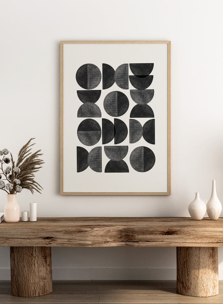 Geometric pattern of black semi-circles on a white background. Geometric Rhythm by The MIUUS Studio is a minimalist abstract art print and wall poster featuring repeating geometric shapes, black and white tones, and modern striped textures.
