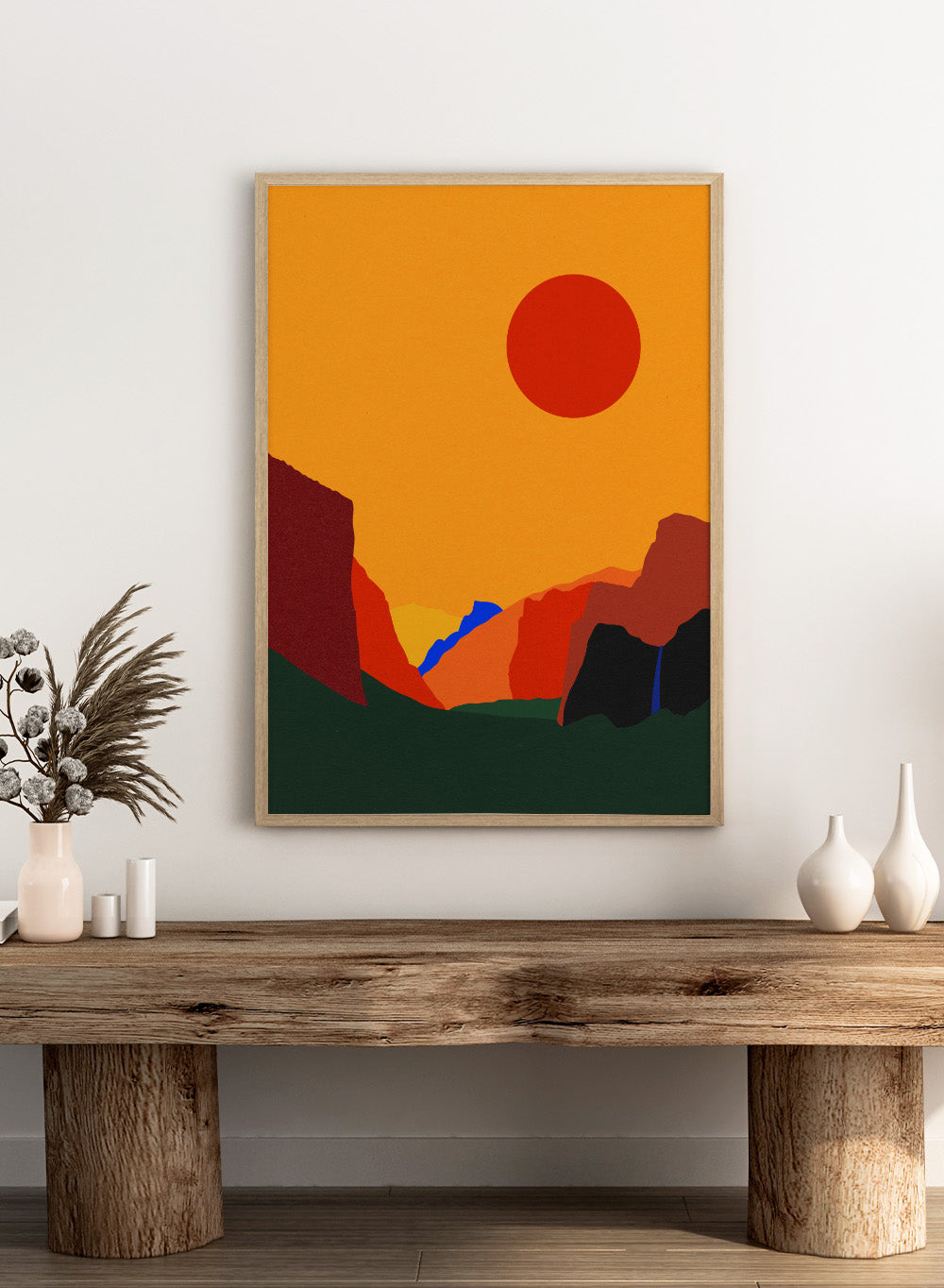 Simplified landscape with red sun, green ground, and brown cliffs. Yosemite Valley by Rosi Feist is a modern minimalist landscape fine art print featuring bold cliffs and a graphic sun. Officially licensed wall poster with optional artisan framing.