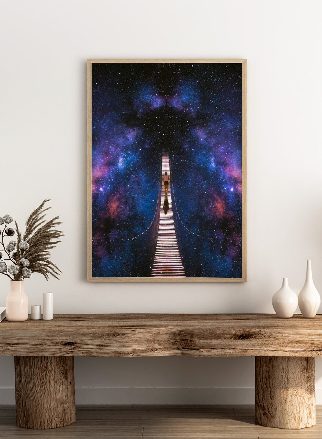 Person standing on a bridge stretching into space with a starry background. Infinity by Taudalpoi surreal cosmic bridge art print with lone figure walking through galaxy starscape, retro sci fi collage poster wall art.