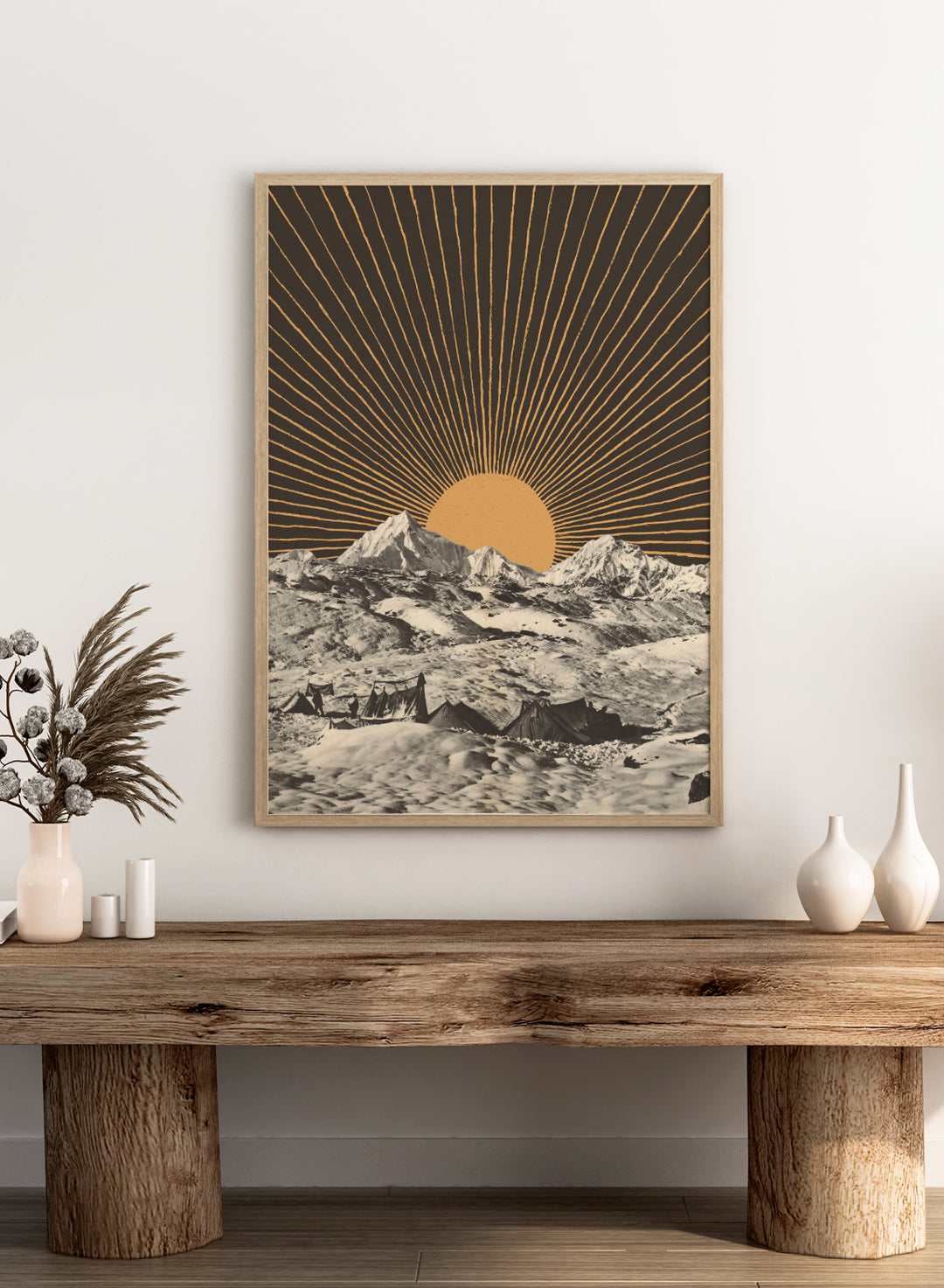 Mountain landscape with a sunburst design in the sky. Mountain Base Camp Sunrise by Florent Bodart is a modern landscape art print with mountains and sunrise rays, a vintage-inspired wall poster with bold graphic contrast.