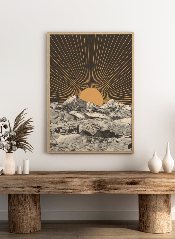Mountain landscape with a sunburst design in the sky. Mountain Base Camp Sunrise by Florent Bodart is a modern landscape art print with mountains and sunrise rays, a vintage-inspired wall poster with bold graphic contrast.