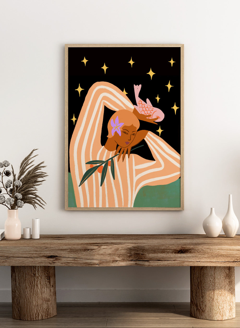 Illustration of a woman with flowers in her hair against a starry night sky. Balance by Arty Guava is a modern surreal woman art print with stars, stripes, and a pink fish. Officially licensed contemporary wall poster.