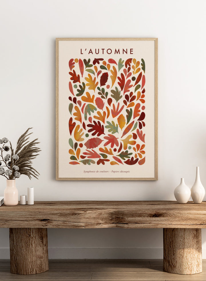 Shop Earthy Organic Leaves by Dominique Vari, an autumn botanical wall art print poster featuring abstract fall leaves in orange, red, olive, mustard, and warm earthy tones.