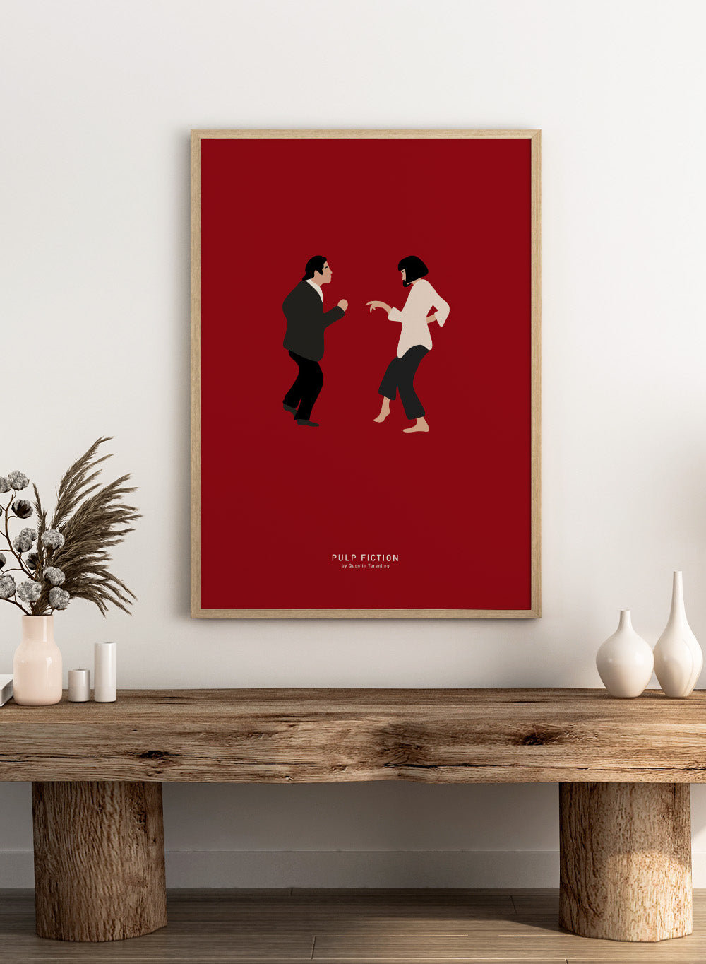 Minimalist illustration of two characters facing each other on a red background with 'Pulp Fiction' text. Minimalist dance illustration of two figures on a red background by Anne-Marie Volfova. Officially licensed modern art print with optional framing.
