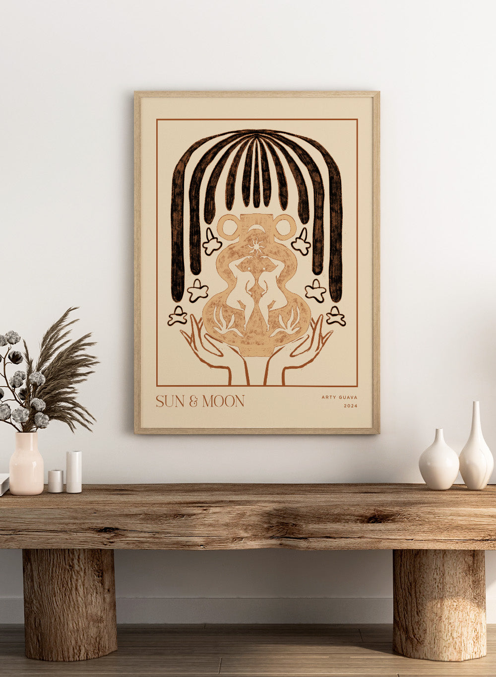 Artistic illustration of hands holding a symbol with 'Sun & Moon' text on a beige background. Vessel Collection: Sun & Moon by Arty Guava art print, modern vase wall poster with moon symbolism, contemporary minimalist line artwork.